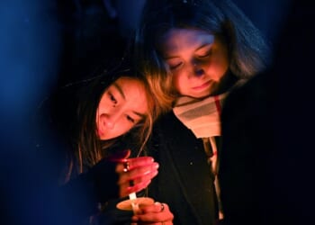 Search for the Brown University shooter resumes as questions swirl about campus security