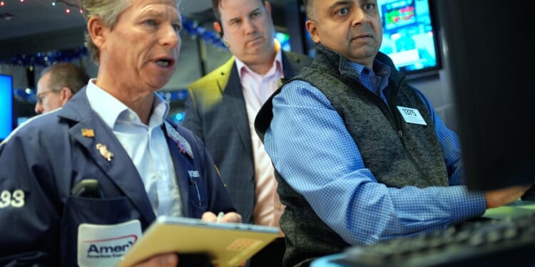 Wall Street holding steady as oil prices rise