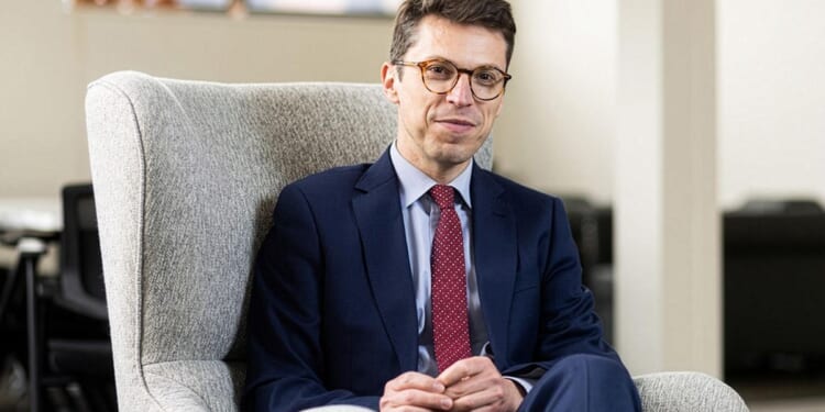 Search goes on for suspect in fatal shooting of MIT professor who was killed at his home