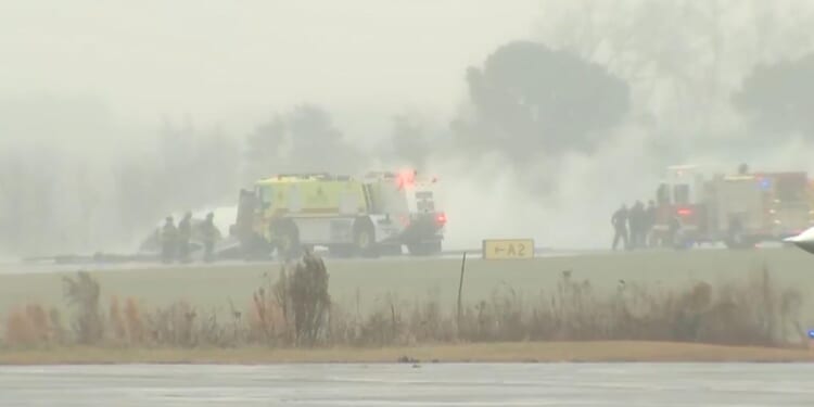 A business jet crashed while landing at a North Carolina airport, erupting in a large fire