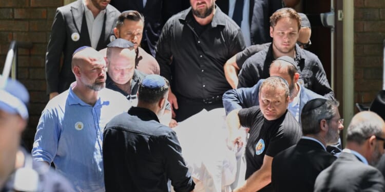 Mourners grieve child killed in Bondi mass shooting as Australian leader pledges new hate laws