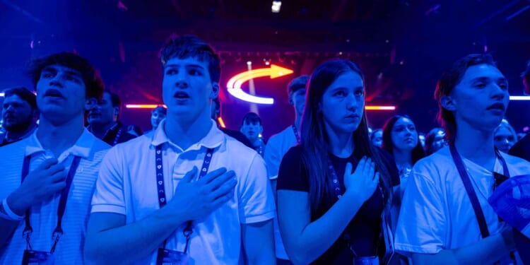 Conservatives clash at Turning Point USA conference over direction of MAGA movement