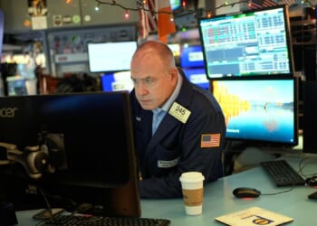 Wall Street hovering near record levels and will close early