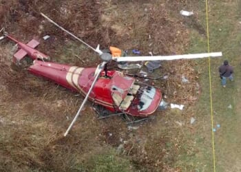 Officials say one person is dead and another is injured after two helicopters crash in New Jersey