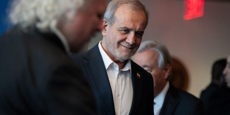 Iran's president says answer to any attack would be harsh in apparent response to Trump warning