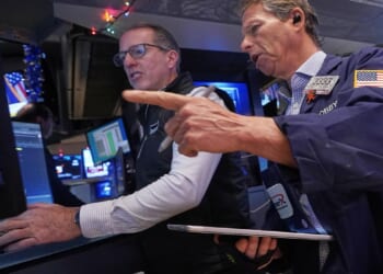 Stocks wavering as 2025 winds down while gold and silver rise