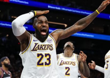 Lebron James of the Los Angeles Lakers looks for a foul call during the first half of a game against the Phoenix Suns at Mortgage Matchup Center on Dec. 14, 2025, in Phoenix, Arizona.