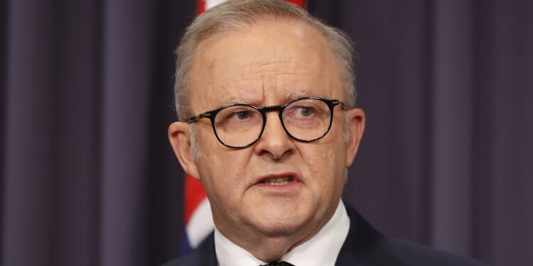 Prime Minister Anthony Albanese speaks to the media Sunday December 14, 2025 in Canberra, Australia, after two gunmen opened fire at Sydney's world-famous Bondi Beach, killing 15 people.