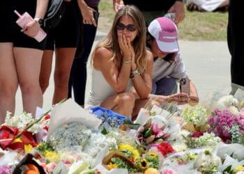 Mourners gather at a tribute to the victims of the Bondi Beach shooting that took place earlier in Sydney, Australia on Dec. 15, 2025.