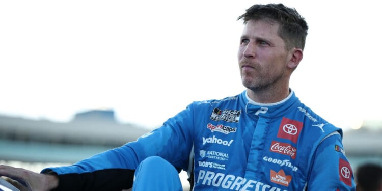 Denny Hamlin, driver of the Progressive Toyota, exits his car after the NASCAR Cup Series Championship at Phoenix Raceway on Nov. 2, 2025, in Avondale, Arizona.