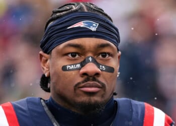 Stefon Diggs #8 of the New England Patriots stands on the sideline during the national anthem Dec. 14 before the game against the Buffalo Bills at Gillette Stadium in Foxborough, Massachusetts.