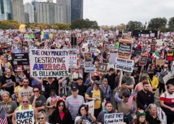 Protestors march in the second "No Kings" protest on Oct. 18, 2025, in Chicago, Illinois.
