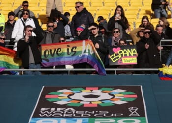 International soccer fans hold pride flags at the FIFA Women's World Cup Australia and New Zealand 2023 Quarter Final match on Aug. 11, 2023 in Wellington, New Zealand.
