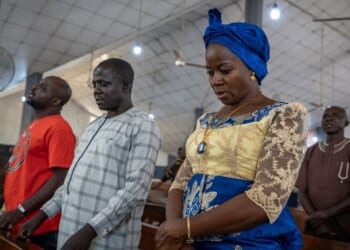 Catholics pray inside Saint Michael's Cathedral during a Sunday service in Minna on Nov. 30, 2025.