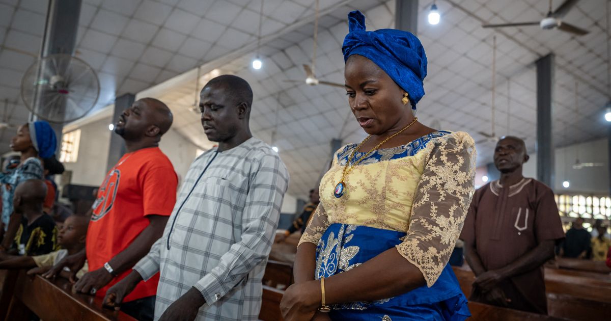 Catholics pray inside Saint Michael's Cathedral during a Sunday service in Minna on Nov. 30, 2025.