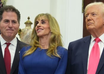 Michael Dell, left, his wife Susan, and President Donald Trump listen during an event on "Trump Accounts" for kids in the Roosevelt Room of the White House on Dec. 2, 2025, in Washington, D.C.