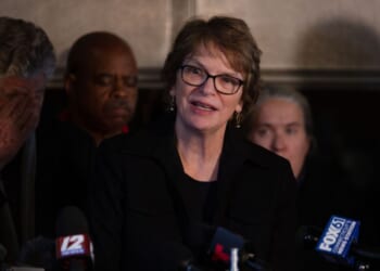 Brown University President Christina Paxson answers journalists' questions during a news conference after a shooting occurred on campus in Providence, Rhode Island, on Dec. 13, 2025.