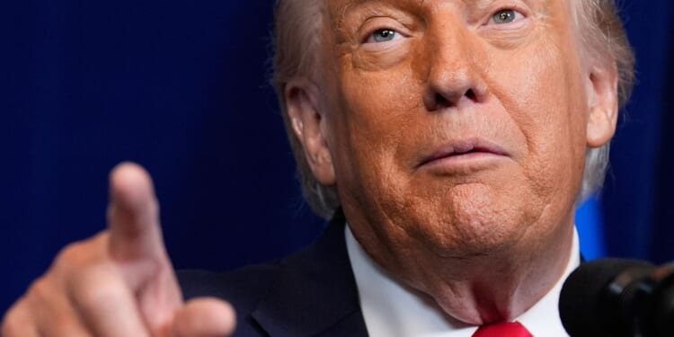 Donald Trump, in interview, defends energy and health, offers new details on screening he underwent