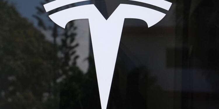 Tesla loses title as world's biggest electric vehicle maker as sales drop for second year in a row