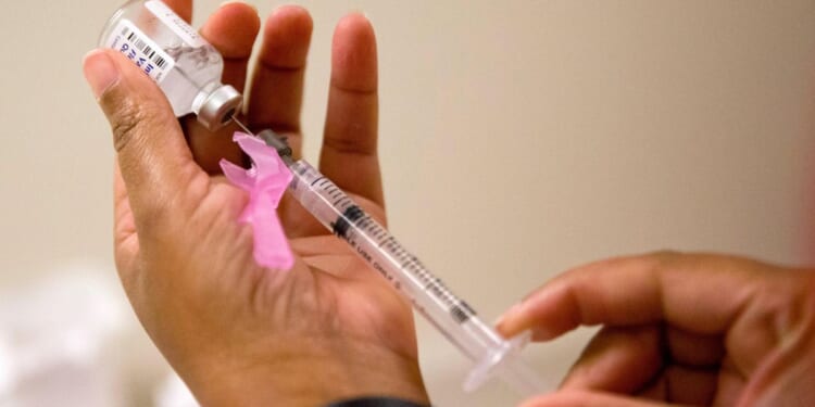 Flu season surged in the U.S. over the holiday and already rivals last winter's harsh epidemic