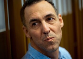 Russia frees French political scholar in swap for a basketball player