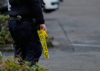 Authorities say federal immigration officers shoot and wound 2 people in Portland, Oregon