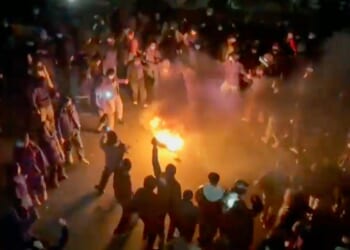 As activists say protest death toll reaches 203, Iran warns against U.S. strikes