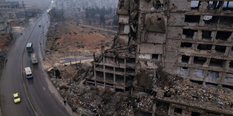 Syrian government forces, Kurds exchange strikes in area near Aleppo declared closed military zone