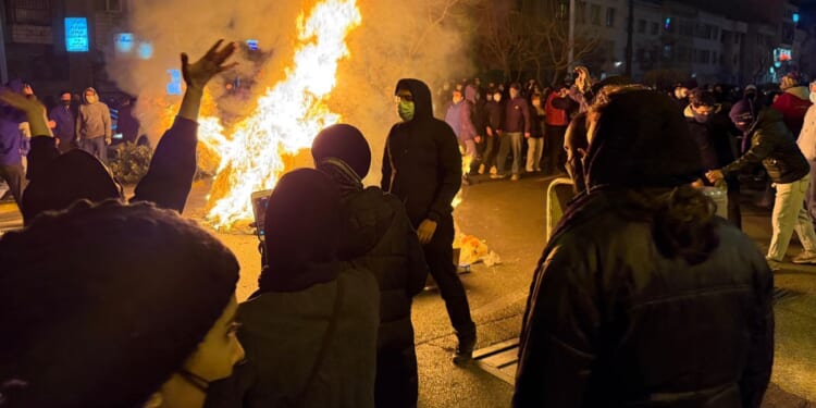 EU leaders threaten tougher sanctions on Iran as protest death toll soars