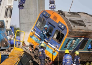 Construction crane crashes onto a moving train in Thailand, killing at least 32 people