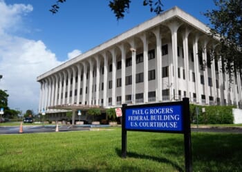 Woman jailed after crashing her vehicle into a South FL federal courthouse, police say