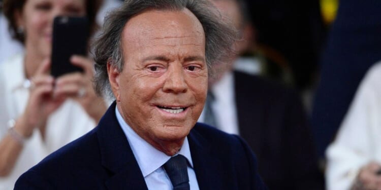 Singer Julio Iglesias denies sexual abuse allegations, calling them 'absolutely untrue'