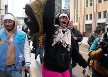 During Minneapolis immigration crackdown, counterprotesters chase off conservative influencer