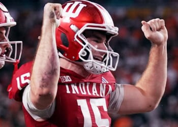 Indiana completes undefeated season and wins first national title, beating Miami 27-21 in CFP final