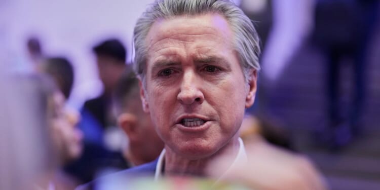 Gov. Newsom warns Europe: Trump is a 'T. rex: You mate with him, or he devours you'