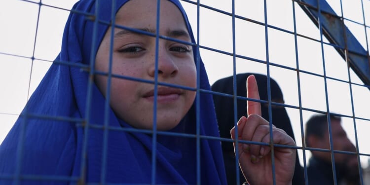 First 150 Islamic State group detainees transferred by U.S. military from Syria to Iraq