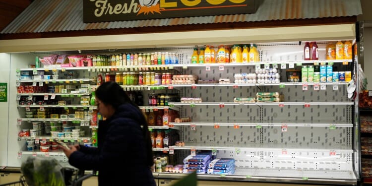 Storm watch: Crews spread salt on roads, people stock up as winter storm threatens the U.S.