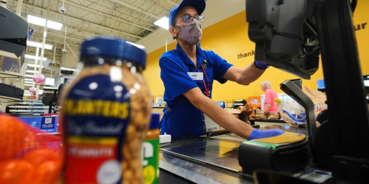 Prices ticked up in November as Americans keep spending a key inflation measure shows