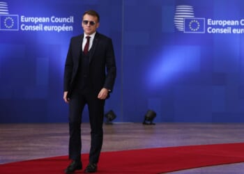 French leader says European pressure forced Trump to back down as the EU reconsiders ties