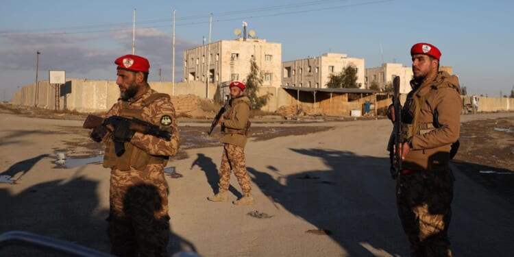 Syrian forces take control of prison housing ISIS members after Kurdish fighters evacuate