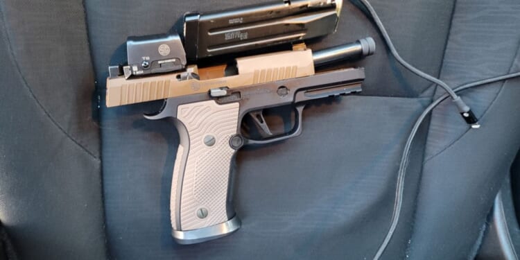 Protester killed Saturday in clash with ICE agents Sig Sauer high-capacity 9mm pistol