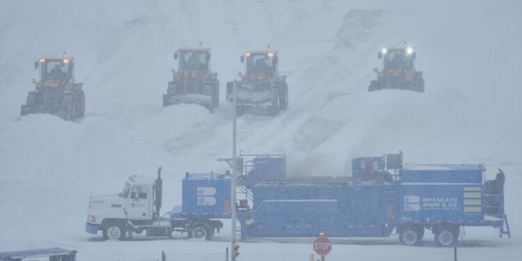 As massive winter storm sweeps across U.S., more than 15,000 flights canceled