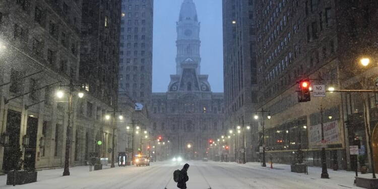 Large winter storm across the U.S. brings ice, frigid temperatures and widespread power outages