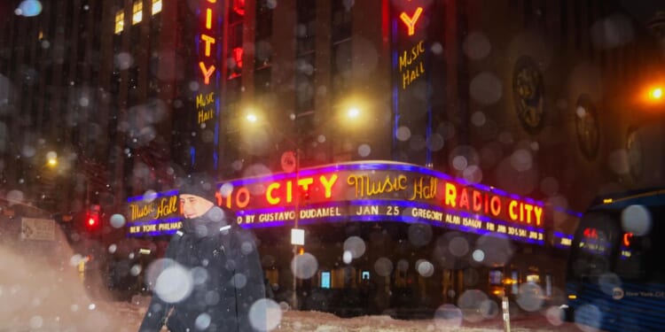 Northeast sees more snowfall from tail end of a colossal winter storm, at least 18 deaths reported