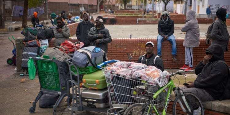 In surprise move, Spain granting legal status to thousands of immigrants lacking permission