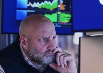 Stocks zigzag on Wall Street following mixed profit reports from GM, UnitedHealth and others