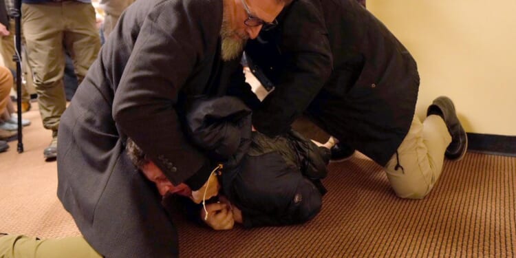 Man sprays Ilhan Omar with unknown substance at Minneapolis town hall