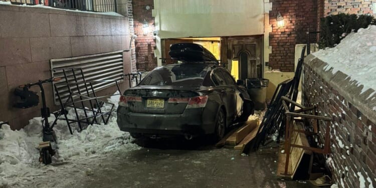 Chabad Lubavitch world headquarters in New York City rammed by car, damaging doors