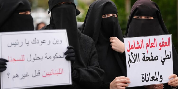 Lebanon's government approves a deal to transfer Syrian prisoners back to Syria