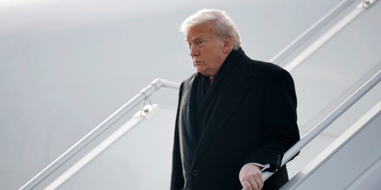 President Donald Trump disembarks Air Force One as he arrives at Zurich Airport before attending the World Economic Forum in Davos, on Jan. 21, 2026, in Zurich, Switzerland.